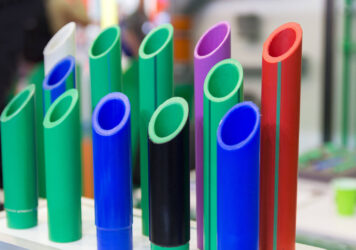 Multicolored plastic water pipes in the store Industry